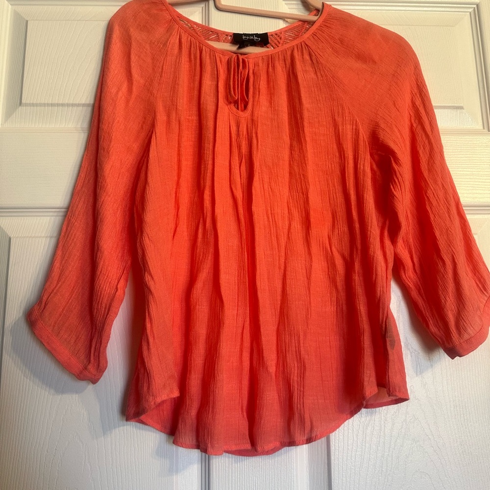 Woman’s Coral top size medium